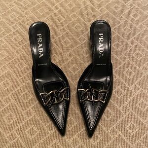 Prada Black Leather Mules with Silver Chain